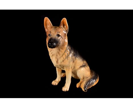 A large fireside Beswick model of a German Shepard dog,  also in the lot a porcelain Borzoide and a marble group of playing d
