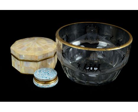 A French 19th century glass bowl, having black enamel decoration of frolocking figures and heightened in gilt, 14.5cm diamete