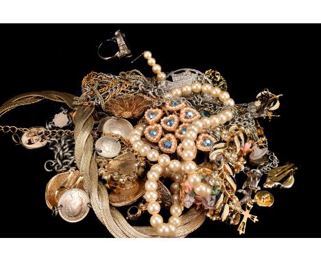 A collection of Victorian and later jewellery, including a pinchbeck fob seal, two gatelink bracelets, a pair of Christian Di