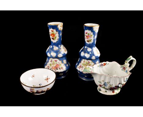 A 19 Century enamel bowl, with floral and courting couple decoration together with a shell sauce boat with h/p floral decorat