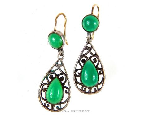A pair of Art Nouveau green agate earrings, featuring yellow gold French wire fittings, a round agate collet- set in silver a