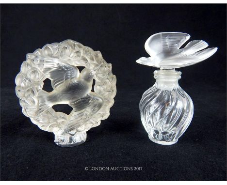 Two 20th century items of Lalique glass ware to include a perfume bottle with a frosted glass stopper in the form of a dove i
