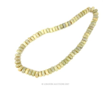 A Jade hoop necklace; 79 cm long