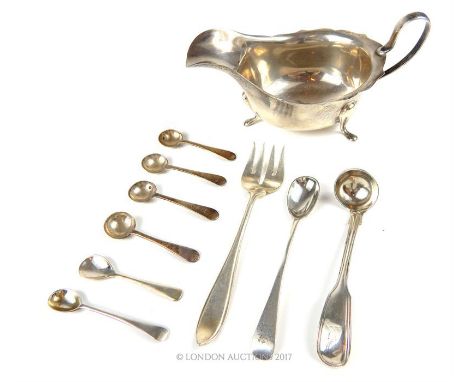 A George V silver sauce boat, Sheffield, 1931, Viners, of usual form with wavy edged rim, together with a a Victorian fiddle 