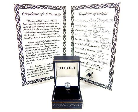 A fine,14 ct white gold mounted Tahitian black pearl pendant accompanied by the original sale receipt and separate certificat