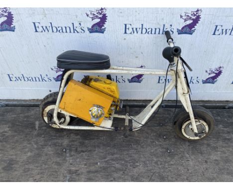 Trojan Trobike Circa 1960's. The Trobike was announced in 1960 as minimalist transport for one and was powered by a 98cc two-