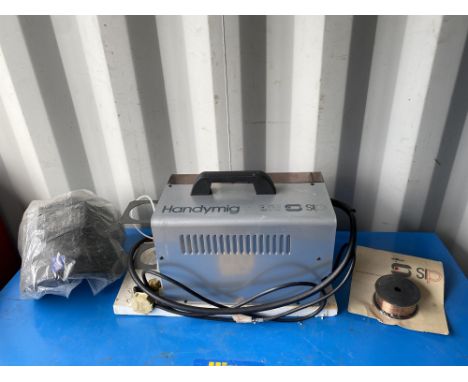 Portable Handymig sip welder with helmet and spare wire. All tools are sold as seen and untested.  Please note this lot has t