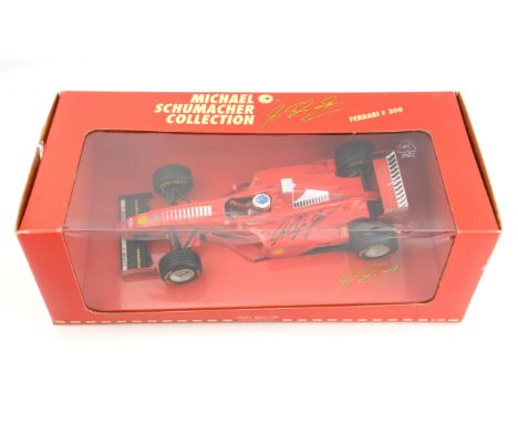 Michael Schumacher - Signed Ferrari F 300 F1 model from the MS Collection, 1:18 Scale, Boxed. This was won at a charity aucti