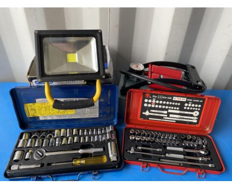 Halfords twin barrel foot pump, 20w LED flood light and 2 socket sets. All tools are sold as seen and untested.  Please note 