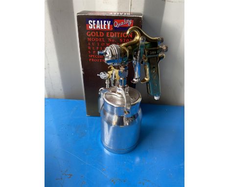 Sealy Gold Edition spray gun.  Model S701. All tools are sold as seen and untested.  Please note this lot has the standard Ew