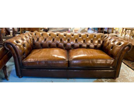 CHESTERFIELD SOFA, vintage hand finished leaf brown leather deep button upholstered curved back and arms with two seat cushio