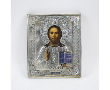 RUSSIAN ICON, with hallmarked silver and enamel detailed oklad, portraying Christ Pantocrator, 26cm H x 22.5cm W. 
