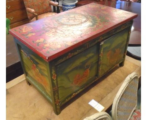 CHINESE TRUNK/CABINET, red and green lacquer with a fixed lid above two doors with floral, tiger and dragon detail. 78cm W x 