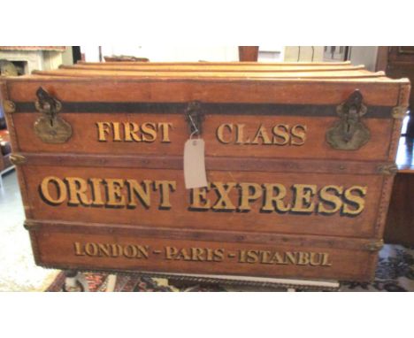 TRUNK, early 20th century with rising lid with gilt lettering 'First Class, Orient Express',  56cm D x 111cm W x 63cm H. (han