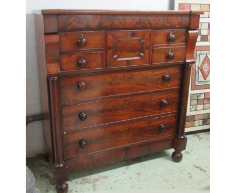 SCOTCH CHEST, Victorian mahogany with a narrow drawer over two short and two deep bonnet drawers above four long flanked by t