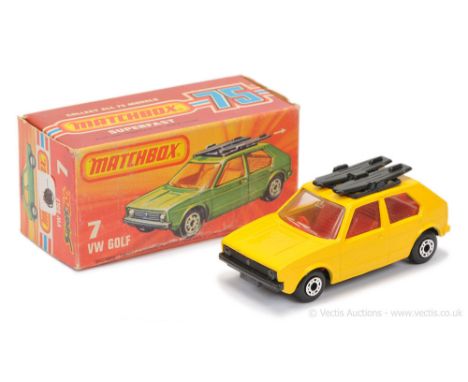 Matchbox Superfast 7c Volkswagen Golf - dark yellow body, clear windows, red interior, METALLIC DARK GRAPHITE GREY BASE (not 