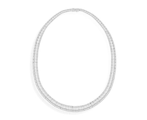 A DIAMOND NECKLACEComposed of a continuous row of baguette-cut diamonds at the centre, between borders of brilliant-cut diamo