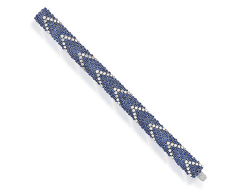 AN ELEGANT SAPPHIRE AND DIAMOND BRACELET, ITALIAN, CIRCA 1960Of fine articulated bombé design, set throughout with circular-c