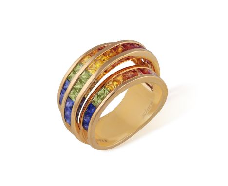 A MULTI-COLOURED SAPPHIRE RINGOf openwork design, the three hoops set with multi-coloured square-shaped sapphires, mounted in