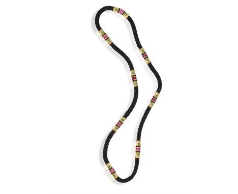 MARINA B: AN ONYX, EMERALD, RUBY AND DIAMOND 'NAJWA' NECKLACE, CIRCA 1982Designed as a rope of onyx beads, spaced by links se
