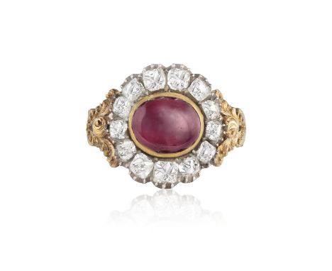 A LATE 18TH CENTURY/EARLY 19TH CENTURY GEORGIAN GARNET AND DIAMOND RINGCentrally set with an oval-shaped garnet cabochon, wit