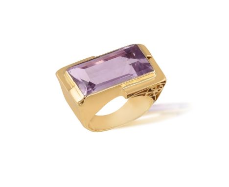 A RETRO AMETHYST RING, FRENCH, CIRCA 1940Of tank design, the elongated rectangular-cut amethyst weighing approximately 11.00c