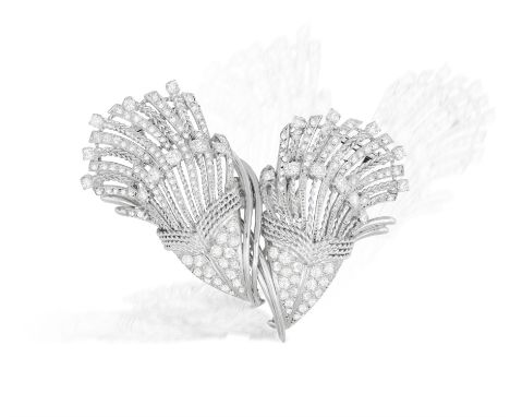 A MID-20TH CENTURY DIAMOND DOUBLE CLIP BROOCH, FRENCH, CIRCA 1955Of cornucopia design, the two motifs of scrolled and twisted