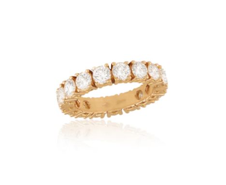 A DIAMOND ETERNITY RINGComposed of a continuous row of brilliant-cut diamonds in claw-setting, mounted in 18K rose gold, diam