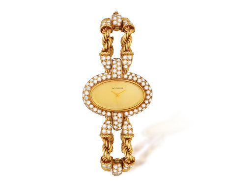 BOUCHERON: A LADY'S DIAMOND-SET COCKTAIL WATCH, CIRCA 1975Of manual wind movement, the oval champagne dial with gilt hands, t