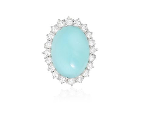 A TURQUOISE AND DIAMOND CLUSTER RINGThe oval-shaped turquoise cabochon weighing approximately 40.00cts, within a multiple-cla