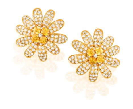 MORONI: A PAIR OF SAPPHIRE AND DIAMOND EARRINGSEach designed as a daisy, petals pavé-set with brilliant-cut diamonds, pistil 