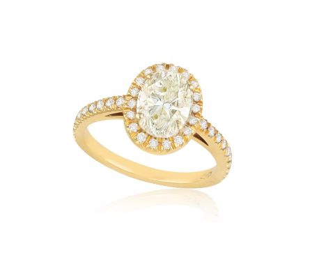 A DIAMOND SINGLE-STONE RINGThe oval-shaped diamond weighing 1.70cts, within a four-claw setting, to a brilliant-cut diamond s
