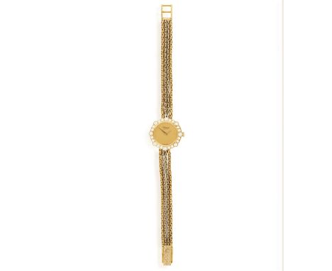 CHOPARD: A LADY'S 18K GOLD AND DIAMOND-SET COCKTAIL WATCH, CIRCA 1980The 7-jewel quartz movement, with circular champagne dia