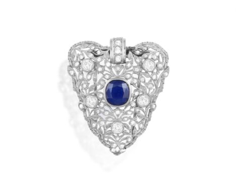 A MID-20TH CENTURY SAPPHIRE AND DIAMOND CLIP BROOCHDesigned as an openwork heart of foliate design, millegrain-set with rose-