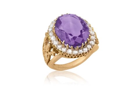 A 19TH CENTURY AMETHYST AND DIAMOND BISHOP'S RINGThe oval-shaped amethyst, within a multiple-claw setting, to a rose-cut diam