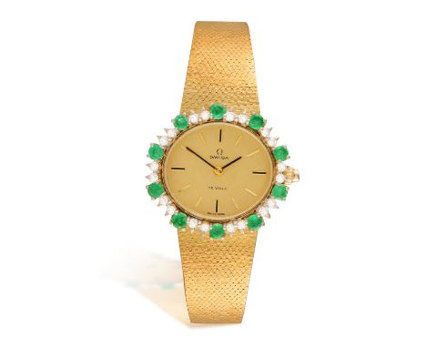 OMEGA: AN EMERALD AND DIAMOND LADY'S COCKTAIL WATCH, CIRCA 1970The 17-jewel Cal-620 manual wind movement, with oval champagne