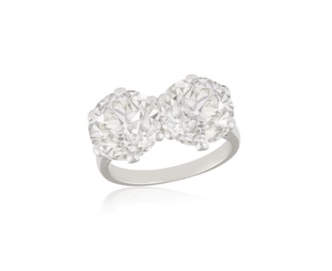  AN IMPORTANT DIAMOND TWO-STONE RING Set with two old brilliant-cut diamonds, each weighing approximately 4.10cts, mounted in