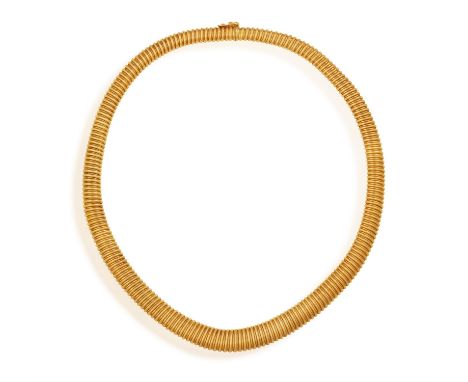 A RETRO GOLD NECKLACE, ITALIAN, CIRCA 1940The flexible gas-pipe link necklace, in 18K gold, Italian registry mark between '19