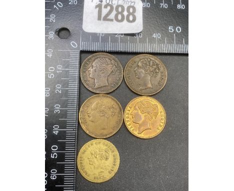 Four Queen Victoria gaming tokens, various sizes and dates and one model of a sovereign