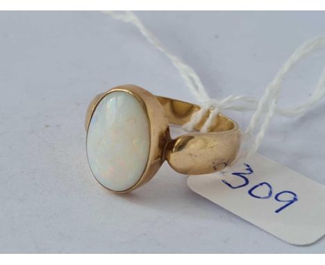 A 9ct oval opal ring, size Q, 5.2 g.