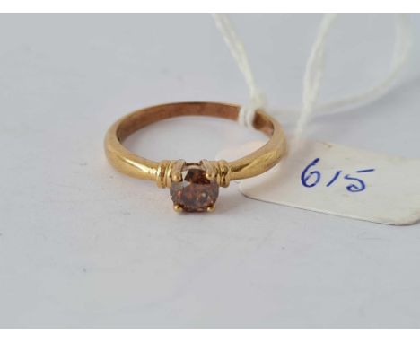 A brown stone ring, 9ct, size P, 2.2 g.