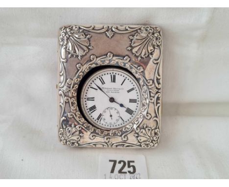 Silver cased travelling clock with a metal cased watch ( W O ) by Meridian Watch Co. Swiss made 3.25 inch high