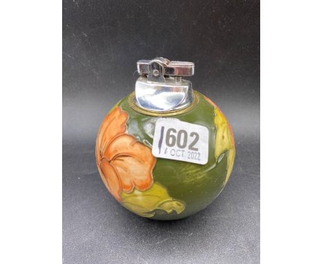 A W. Moorcroft cigarette lighter with label, 4.5” high