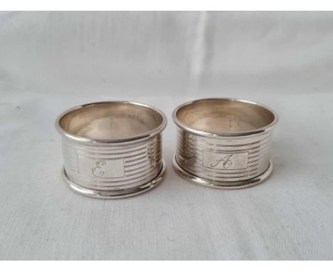 A pair of napkin rings with engine turned decoration, Birmingham 1935?