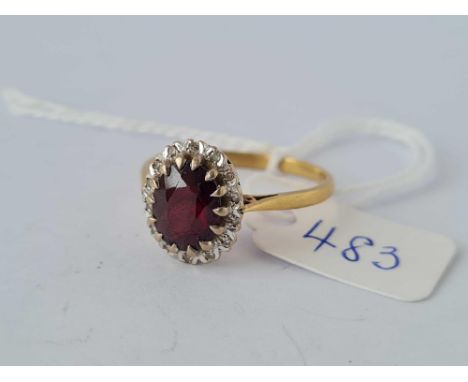 A garnet and diamond ring, 18ct, size T, 4.4 g.