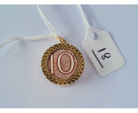 Vintage 10 shilling note charm in 9ct gold.