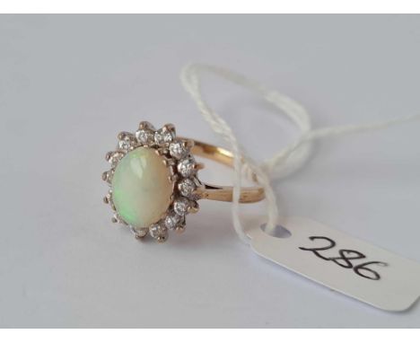 A fine opal and diamond daisy cluster ring, 9ct, size P, 3.0 g.
