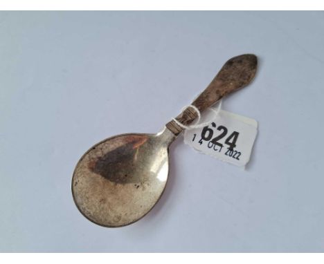 A Georg Jensen Danish caddy spoon with hammered finish