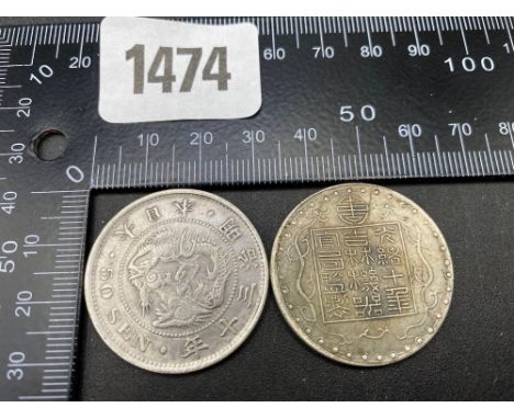 Two Chinese silver coins