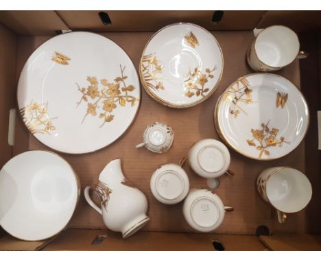 A collection of early 20th century heavy gilt on white tea ware including 5 saucers, 5 side plates, 5 cups, milk jug, sugar b